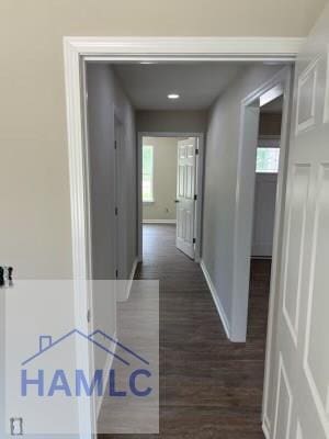363 Sea Island Rd, Jesup, GA 31545 - corridor with baseboards and dark wood finished floors