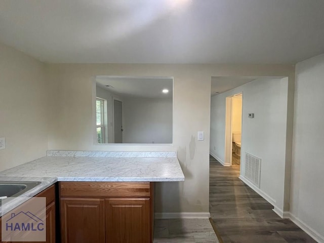 kitchen featuring dark hardwood / wood-style floors