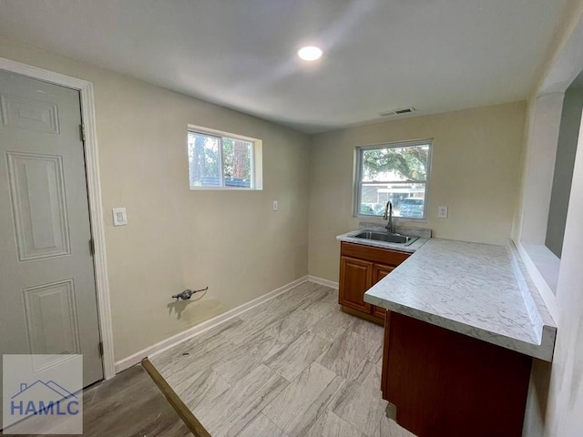 laundry area with sink