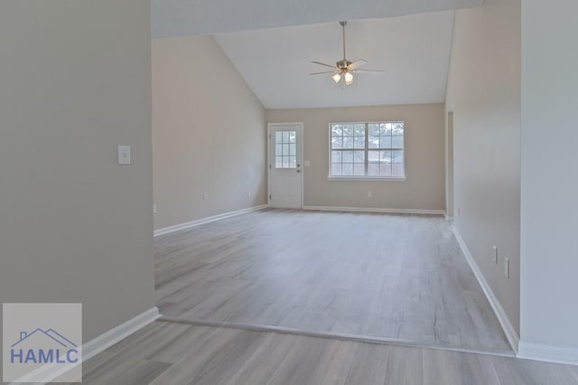 52 Pheasant Way, Hinesville, GA 31313 - empty room featuring a ceiling fan, lofted ceiling, baseboards, and wood finished floors