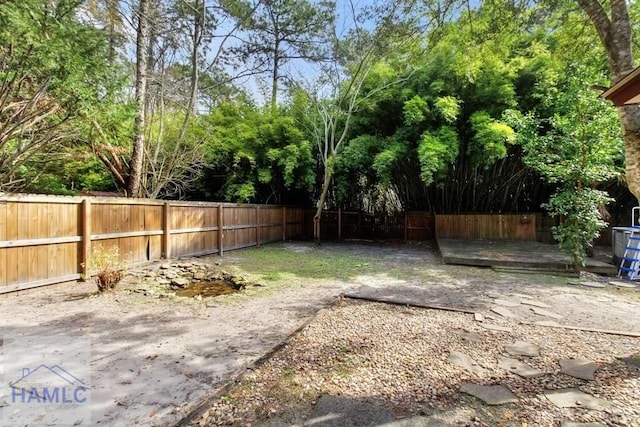 view of yard featuring a fenced backyard