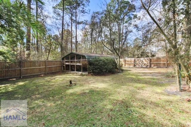 view of yard with a fenced backyard