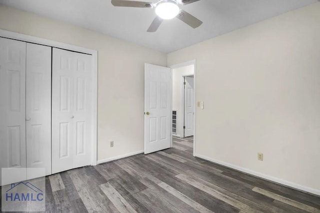 unfurnished bedroom with a closet, ceiling fan, baseboards, and wood finished floors