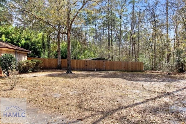 view of yard featuring fence