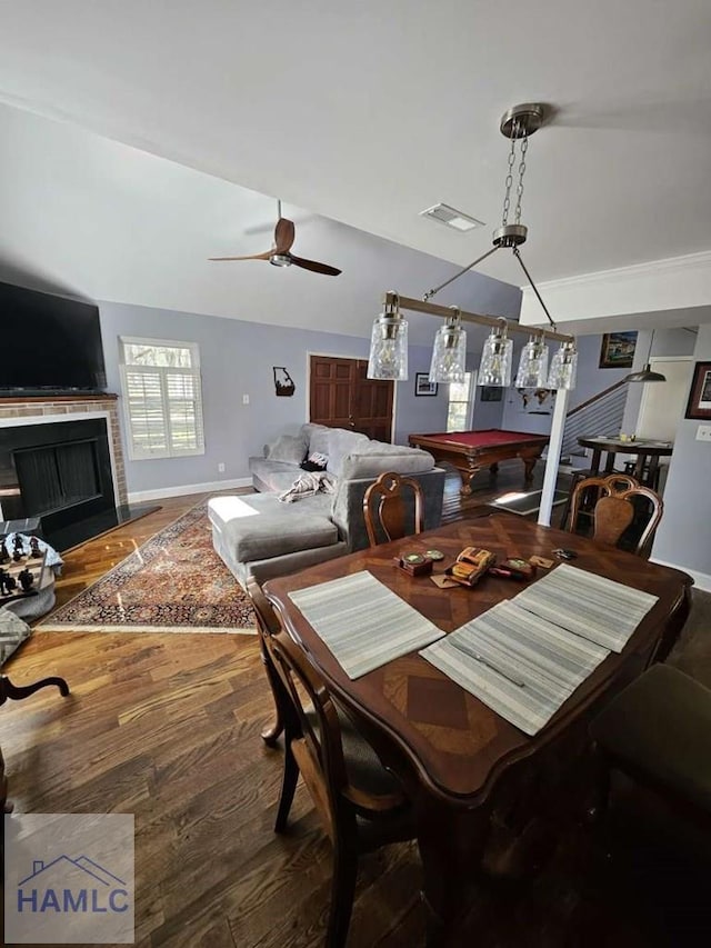 dining area featuring hardwood / wood-style flooring, ceiling fan, lofted ceiling, and billiards