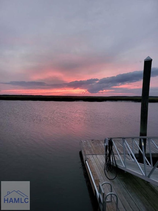 dock area featuring a water view