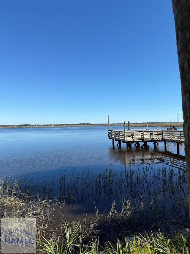 view of dock with a water view