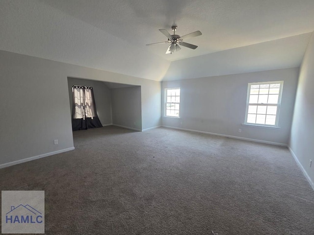 132 Turpentine Trl, Hinesville, GA 31313 - empty room featuring ceiling fan, baseboards, carpet floors, and vaulted ceiling