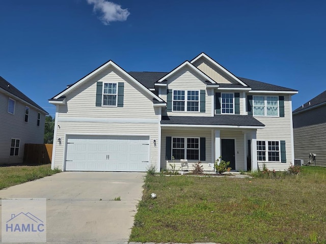 132 Turpentine Trl, Hinesville, GA 31313 - view of front of property featuring concrete driveway, a garage, a front yard, a porch, and central AC unit