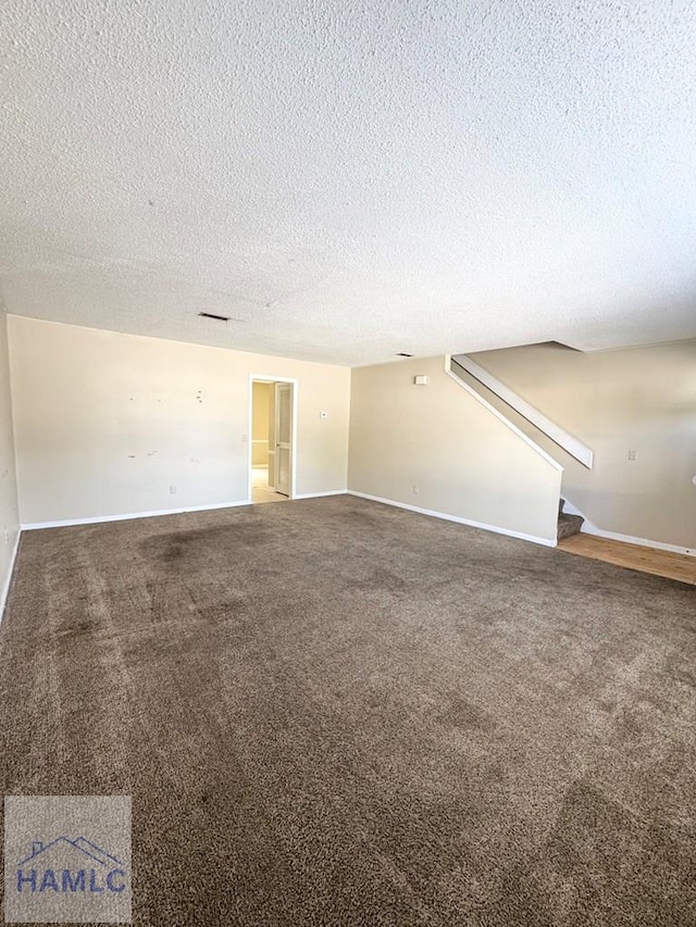 interior space with a textured ceiling