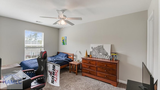 25 Walker Ct, Richmond Hill, GA 31324 - bedroom featuring baseboards, visible vents, ceiling fan, and carpet flooring