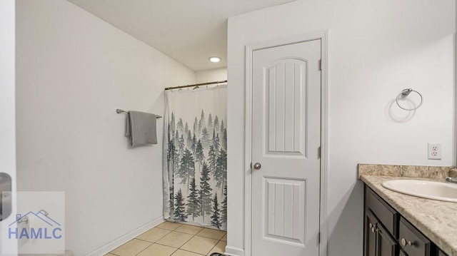 25 Walker Ct, Richmond Hill, GA 31324 - bathroom with tile patterned flooring, vanity, and baseboards