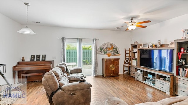 25 Walker Ct, Richmond Hill, GA 31324 - living area featuring wood finished floors, visible vents, and ceiling fan