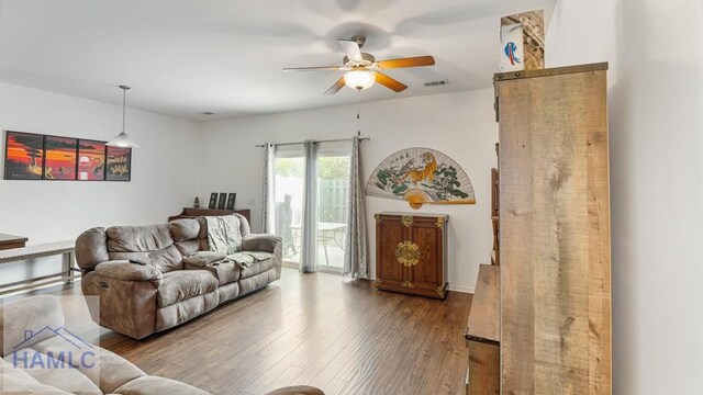25 Walker Ct, Richmond Hill, GA 31324 - living room with a ceiling fan, visible vents, and wood finished floors