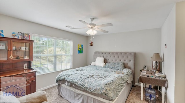 25 Walker Ct, Richmond Hill, GA 31324 - bedroom with baseboards, visible vents, a ceiling fan, and light colored carpet