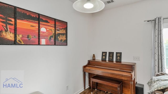 25 Walker Ct, Richmond Hill, GA 31324 - sitting room featuring baseboards, visible vents, and wood finished floors
