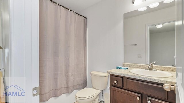 25 Walker Ct, Richmond Hill, GA 31324 - full bath with toilet, vanity, and shower / bathtub combination with curtain