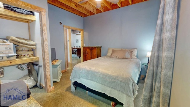 26 Cason Rd, Pembroke, GA 31321 - bedroom with beam ceiling and carpet