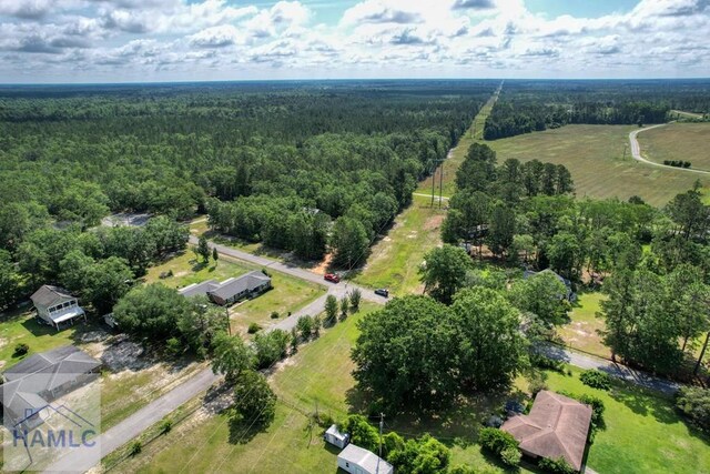 26 Cason Rd, Pembroke, GA 31321 - view of property location with a heavily wooded area