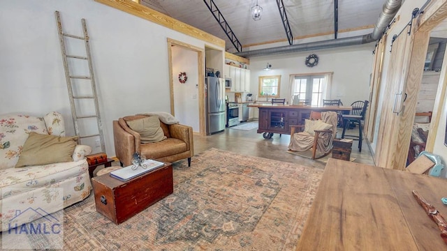 26 Cason Rd, Pembroke, GA 31321 - living area featuring concrete floors and french doors