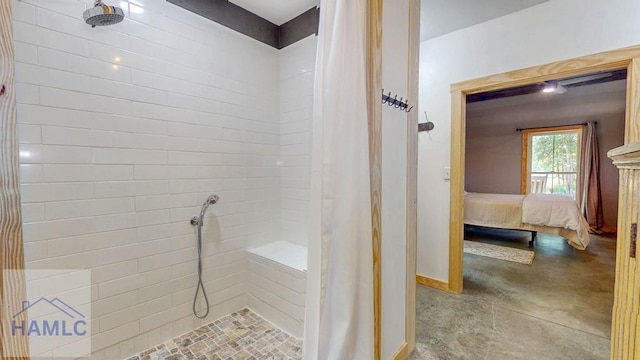 26 Cason Rd, Pembroke, GA 31321 - ensuite bathroom featuring tiled shower and concrete floors