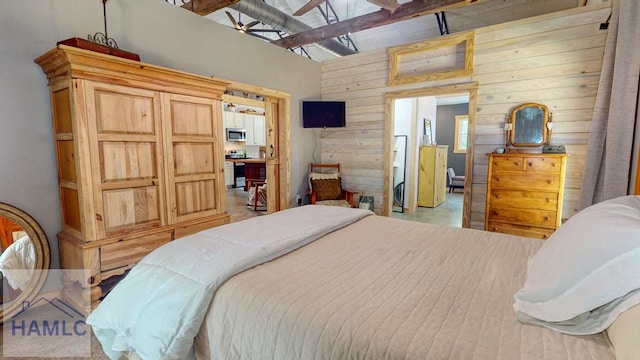 26 Cason Rd, Pembroke, GA 31321 - bedroom with wooden walls and lofted ceiling