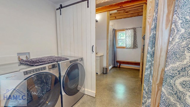 26 Cason Rd, Pembroke, GA 31321 - washroom featuring washing machine and clothes dryer and a barn door