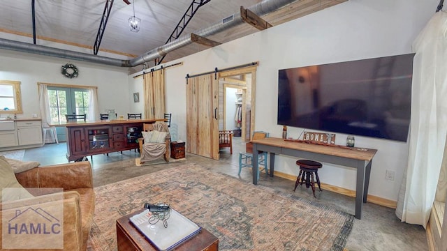 26 Cason Rd, Pembroke, GA 31321 - living area featuring a barn door