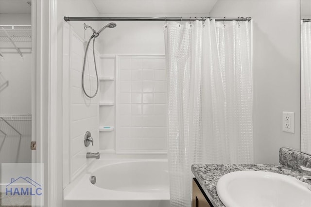 full bathroom with shower / bathtub combination with curtain and vanity