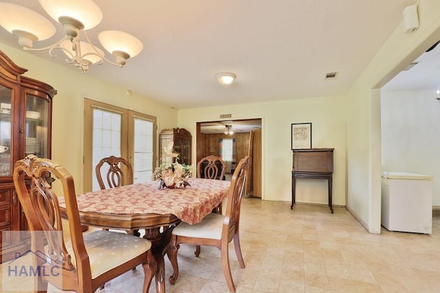 455 N Mahogany St, Jesup, GA 31546 - dining area featuring a chandelier and french doors
