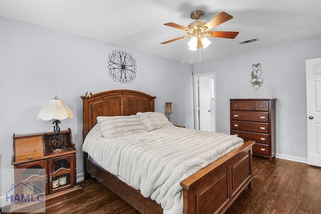209 Chandra Way, Hinesville, GA 31313 - bedroom with dark wood-style flooring, baseboards, and ceiling fan