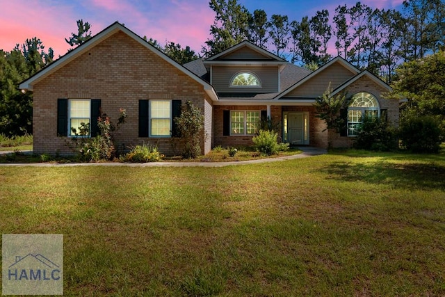 791 Stafford Dairy Rd SE, Ludowici, GA 31316 - view of front of house featuring brick siding and a front yard