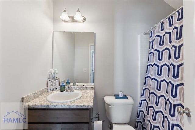 263NE Summer Hill Dr, Ludowici, GA 31316 - bathroom featuring toilet, vanity, and a shower with shower curtain