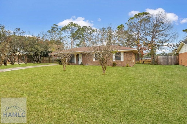 ranch-style house with a front lawn