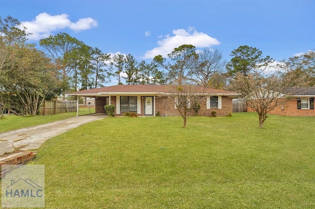 ranch-style home featuring a front yard and a carport