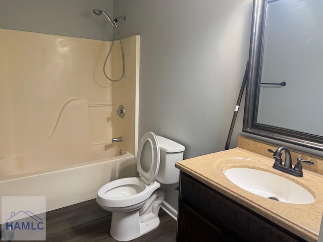 1021 Barley Dr, Hinesville, GA 31313 - full bath featuring vanity, shower / washtub combination, and wood finished floors
