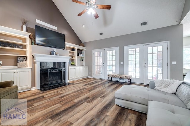 202 Red Bluff Cir, Rincon, GA 31326 - living room with french doors, wood finished floors, high vaulted ceiling, a ceiling fan, and plenty of natural light