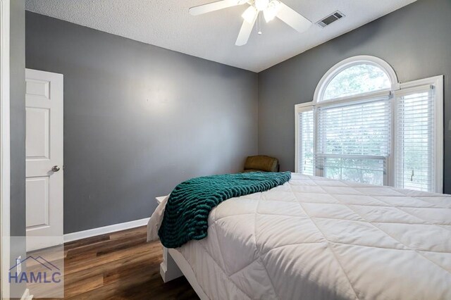 202 Red Bluff Cir, Rincon, GA 31326 - bedroom featuring wood finished floors and a ceiling fan