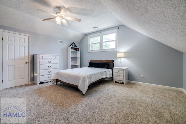 202 Red Bluff Cir, Rincon, GA 31326 - bedroom with a textured ceiling, carpet, lofted ceiling, and ceiling fan