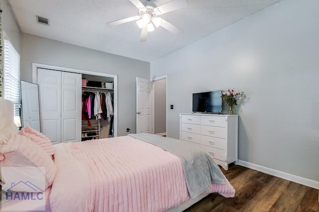 202 Red Bluff Cir, Rincon, GA 31326 - bedroom with dark wood finished floors, a closet, and a ceiling fan