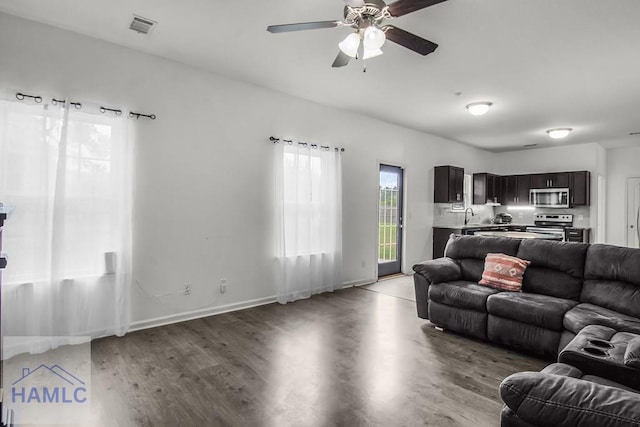 134 Dove Run Dr NE, Ludowici, GA 31316 - living room with light wood-style flooring and a ceiling fan