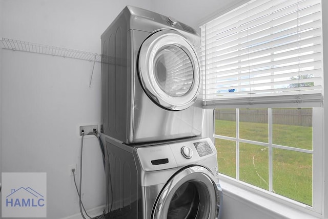 134 Dove Run Dr NE, Ludowici, GA 31316 - laundry room featuring stacked washer and clothes dryer