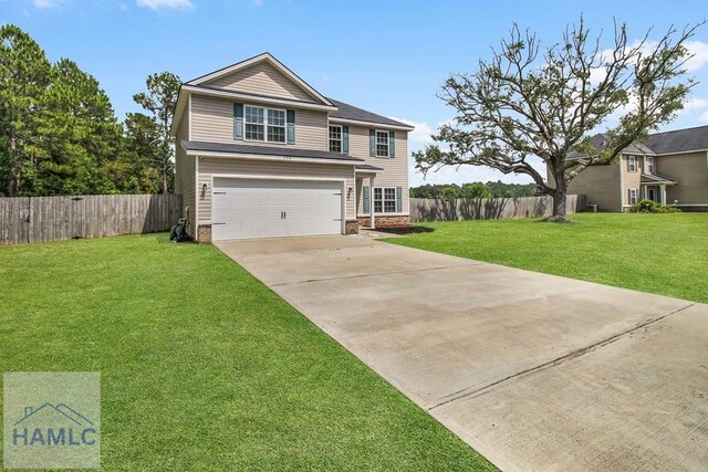 134 Dove Run Dr NE, Ludowici, GA 31316 - traditional-style home featuring an attached garage and concrete driveway