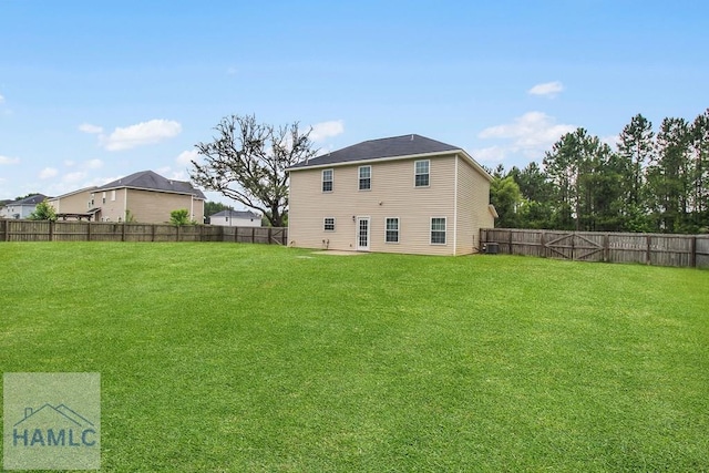 134 Dove Run Dr NE, Ludowici, GA 31316 - back of house featuring a fenced backyard