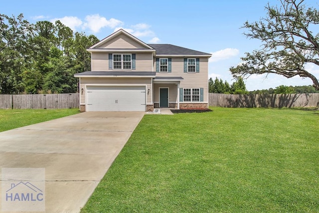 134 Dove Run Dr NE, Ludowici, GA 31316 - view of front facade featuring an attached garage and driveway