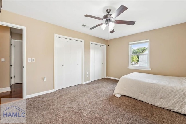 1019 Bacon Rd, Hinesville, GA 31313 - bedroom with multiple closets, carpet flooring, baseboards, and a ceiling fan