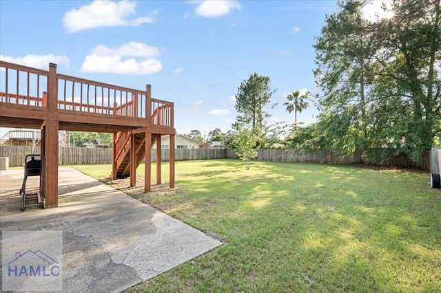 1019 Bacon Rd, Hinesville, GA 31313 - view of yard with stairs, a patio, and a deck