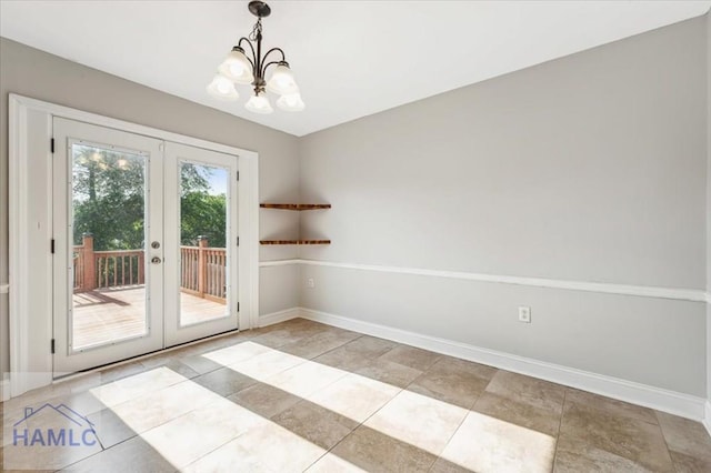 1019 Bacon Rd, Hinesville, GA 31313 - unfurnished dining area featuring french doors, a chandelier, baseboards, and light tile patterned flooring
