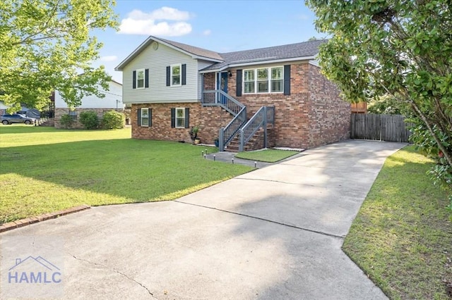 1019 Bacon Rd, Hinesville, GA 31313 - tri-level home featuring brick siding and concrete driveway