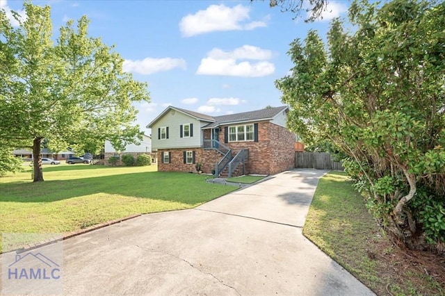 1019 Bacon Rd, Hinesville, GA 31313 - split level home featuring brick siding and concrete driveway